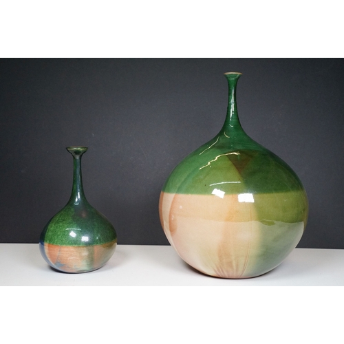 66 - 20th century European narrow neck bud vase of bulbous proportions, with green, blue and terracotta t... 