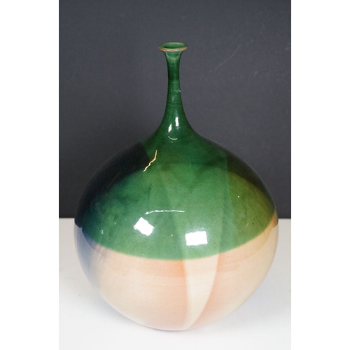 66 - 20th century European narrow neck bud vase of bulbous proportions, with green, blue and terracotta t... 
