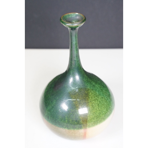 66 - 20th century European narrow neck bud vase of bulbous proportions, with green, blue and terracotta t... 