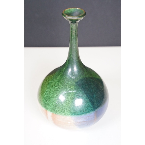 66 - 20th century European narrow neck bud vase of bulbous proportions, with green, blue and terracotta t... 