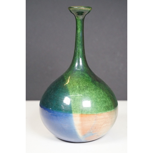 66 - 20th century European narrow neck bud vase of bulbous proportions, with green, blue and terracotta t... 