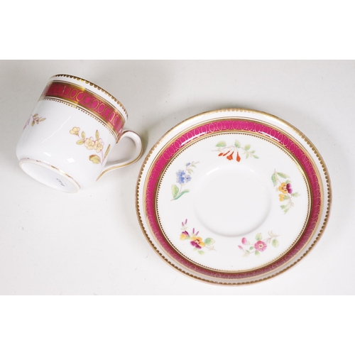 68 - Minton hand-painted cup and saucer decorated with butterflies, moths and foliage, the handle modelle... 