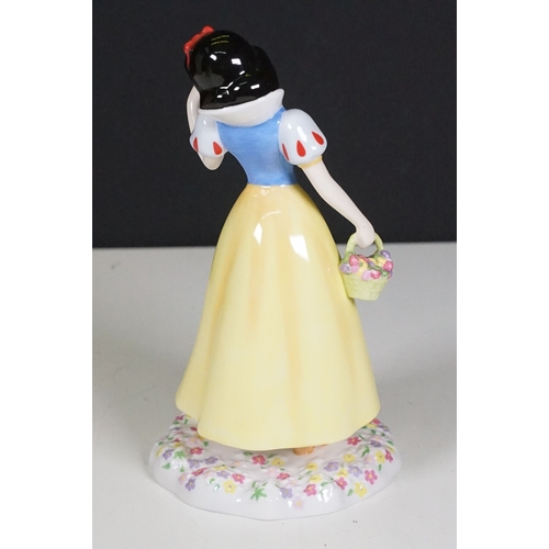 72 - Two boxed ceramic figurines to include Royal Doulton Walt Disney Showcase Collection Snow White and ... 
