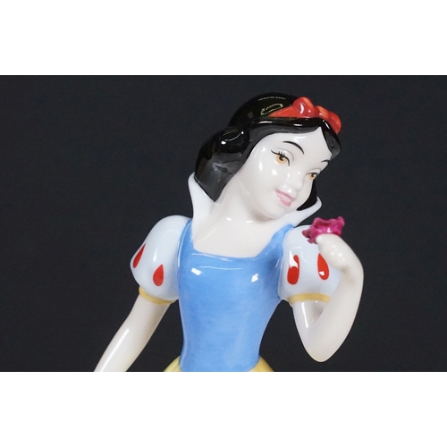72 - Two boxed ceramic figurines to include Royal Doulton Walt Disney Showcase Collection Snow White and ... 