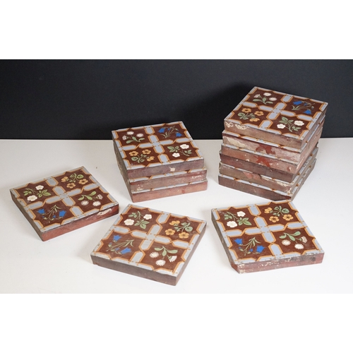 74 - Set of twelve Minton & Co encaustic tiles, with stylised floral design in the manner of Pugin, each ... 