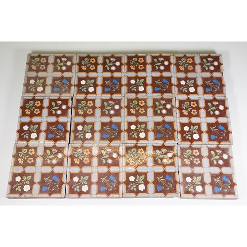 74 - Set of twelve Minton & Co encaustic tiles, with stylised floral design in the manner of Pugin, each ... 