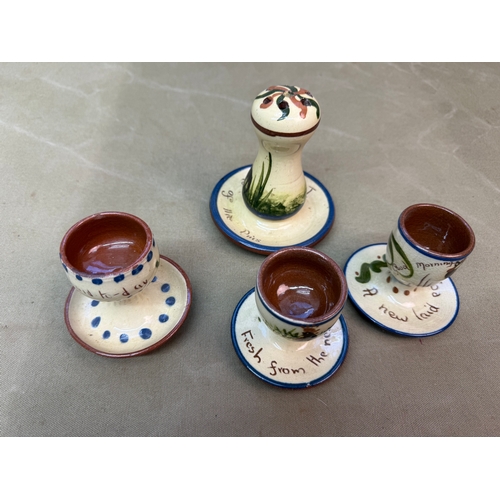 DEVON WARE , 3 EGG CUPS AND A HAT PIN STAND