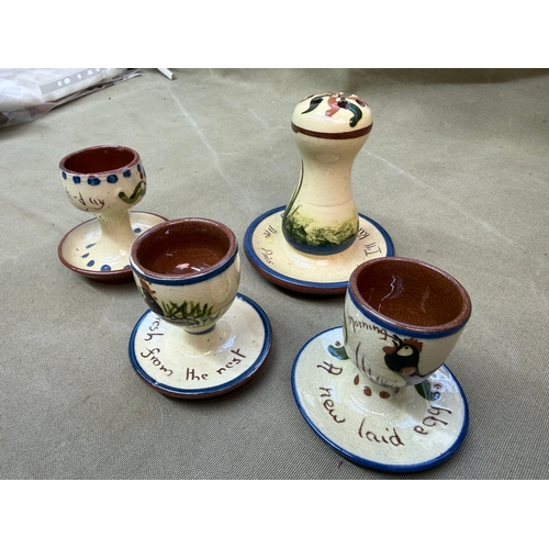 DEVON WARE , 3 EGG CUPS AND A HAT PIN STAND