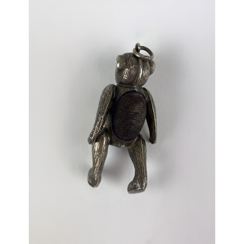 103 - An Edward VI novelty silver articulated bear pin cushion pendant with jointed legs, muzzled nose, pi... 