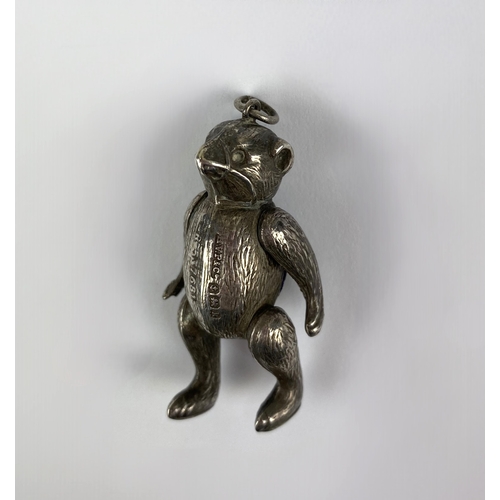 103 - An Edward VI novelty silver articulated bear pin cushion pendant with jointed legs, muzzled nose, pi... 