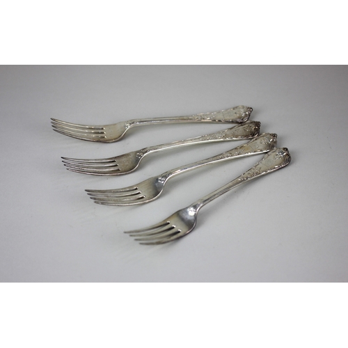 131 - A set of four Victorian silver dinner forks cast handles with engraved initials and armorial, maker ... 