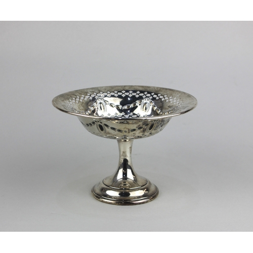 195 - An Edwardian silver tazza pierced bowl embossed with harebell swags, on circular loaded base, maker ... 