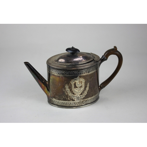 201 - A George III silver teapot oval shape with domed lid engraved laurel cartouche and armorial with flo... 