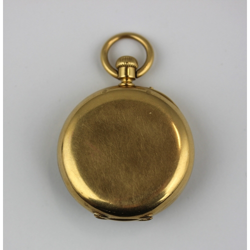 213 - A gold cased keyless wind open faced fob watch detailed '18k', the outer case plain, the inner case ... 