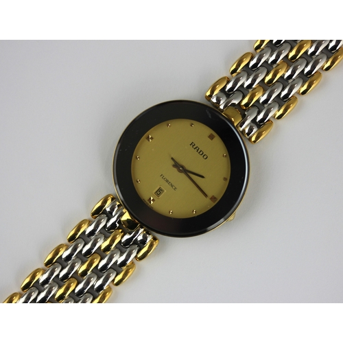 235 - A Rado Florence gilt metal and steel gentleman's bracelet wristwatch with a signed gilt dial, date a... 