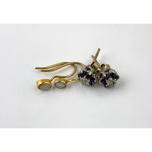 297 - A pair of 9ct gold sapphire and diamond seven stone cluster ear studs with post and butterfly fittin... 