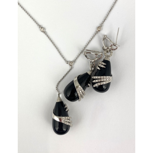 300 - An 18ct white gold black onyx and diamond pendant necklace, the front drop with a diamond trefoil mo... 