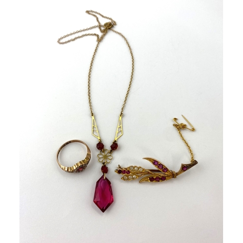 305 - A gold ruby and cultured pearl brooch designed as a spray, fitted with a safety chain, gross weight ... 