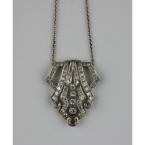 306 - A diamond pendant necklace pierced in a geometric design mounted with cushion shaped and circular cu... 