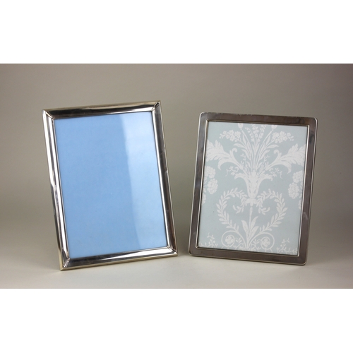 31 - A modern silver rectangular photograph frame aperture 25cm by 20cm, maker Carr's, Sheffield 1993 and... 