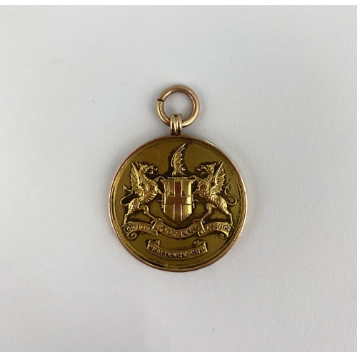 345 - Football Interest: a15ct gold London Football Association Challenge Cup winners medallion to S C San... 