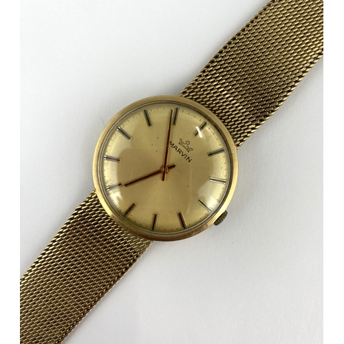 350 - A Marvin 9ct gold gentleman's bracelet wristwatch, the signed gilt dial with baton hour markers, the... 