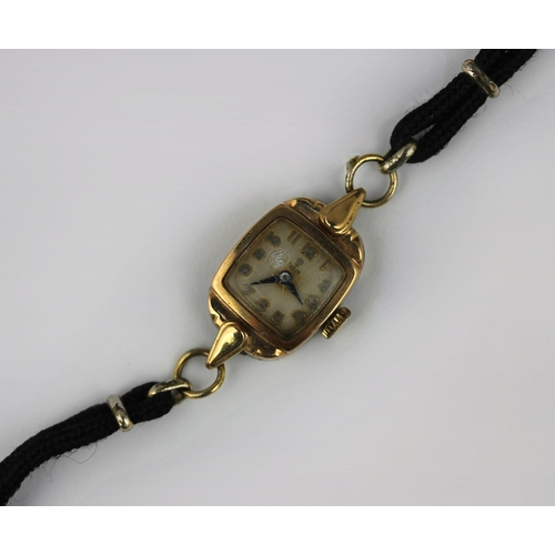 358 - A Tudor 9ct gold cased lady's wristwatch with a signed movement and dial having Arabic numerals, the... 