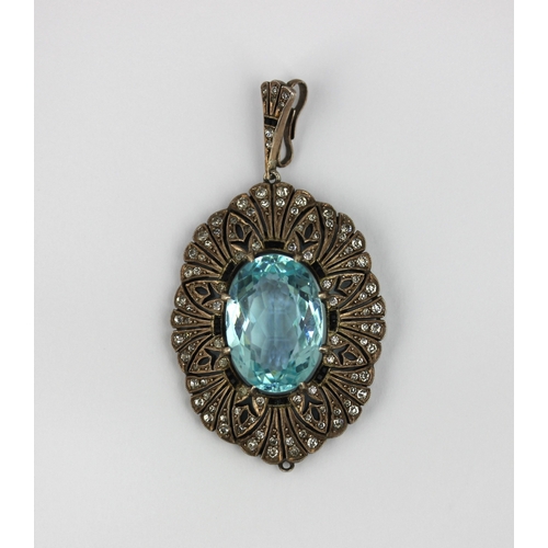 365 - A pale blue and colourless paste shaped oval pendant c1925