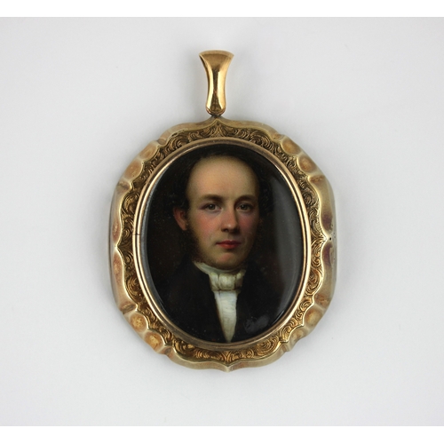 367 - A gold oval pendant glazed with a portrait miniature of a Victorian gentleman, with separate ceramic... 