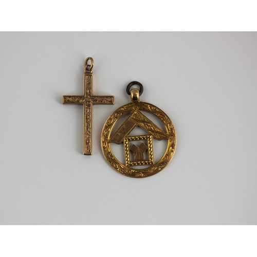 369 - A 15ct gold freemason pendant 5.2g, and a 9ct gold crucifix pendant, presentation engraved, 1.7g