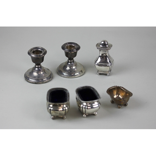 40 - A George V silver three piece cruet set of two salts and a pepper pot, London 1913 another salt crue... 