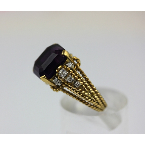 502 - A gold, amethyst and diamond ring of rope twist design, unmarked, ring size S, gross weight 11.5g