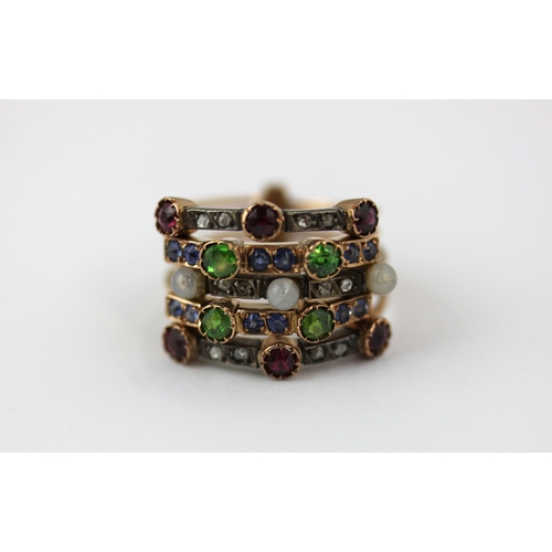 504 - A gold and silver set ruby demantoid garnet, sapphire, rose diamond and imitation pearl ring in a fi... 