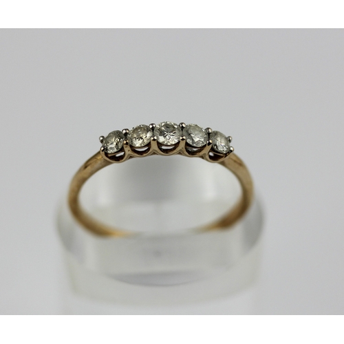 506 - A 9ct gold and diamond five stone ring claw set with a row of circular cut diamonds detailed '9k', r... 