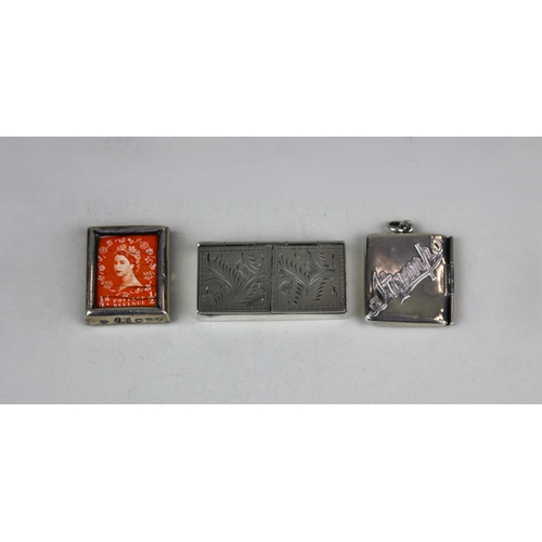 65 - An Edward VII silver stamp case in the form of an envelope, Chester 1908, a miniature silver frame a... 