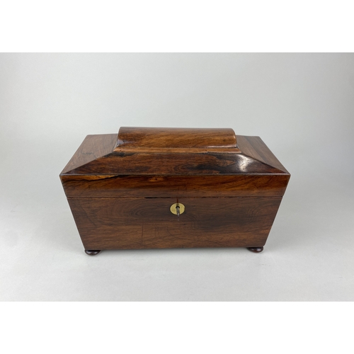 776 - A 19th century rosewood sarcophagus shaped tea caddy 30cm, with key