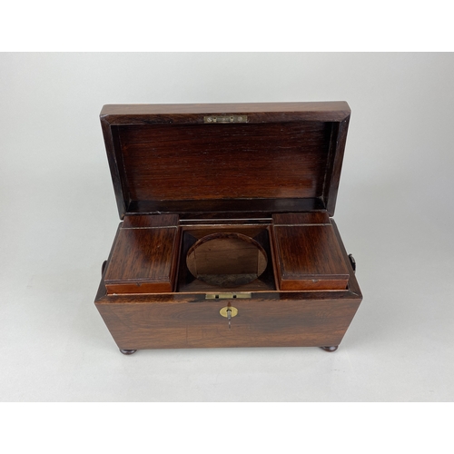 776 - A 19th century rosewood sarcophagus shaped tea caddy 30cm, with key