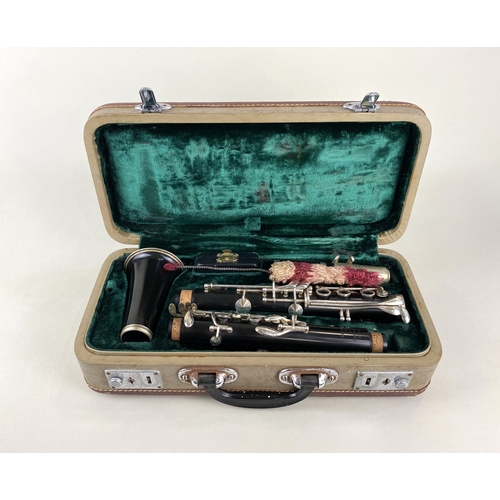 777 - A cased clarinet marked 'Console Steelebonite, Foreign' in fitted case