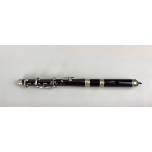 783 - A Piccolo, seemingly unsigned but of good quality and finish, white metal mounted, 30cm long