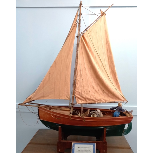 786 - A wooden scale model of a Falmouth working boat, 'Harry' on rest with plaque, 'Harry a 30ft long, tr... 