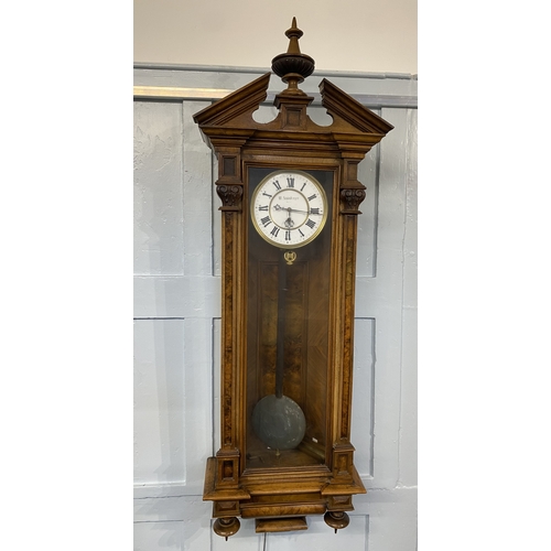 791 - An M Schonberger walnut Vienna wall clock with broken arch surmount and vase finial, 16cm white enam... 