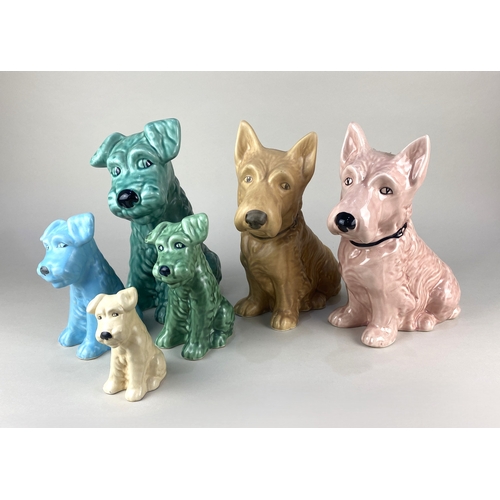 122 - Six Sylvac post 1982 models of dogs comprising two no 1209 in pink and coffee coloured glaze 28cm hi... 