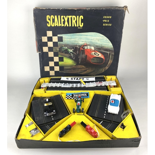 186 - A boxed Tri-ang Scalextric set including two cars and transformer (unchecked), together with three T... 