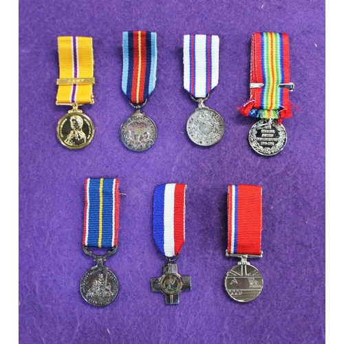 189 - 'British Campaign & Gallantry Medals', replicas, displayed in a military campaign style frame, p... 