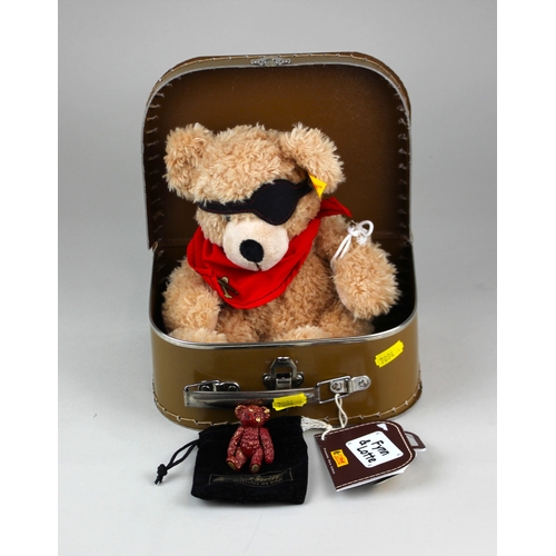 190 - A Steiff 'Pirate' 672828 teddy bear, in original suitcase box, together with a miniature enamelled m... 