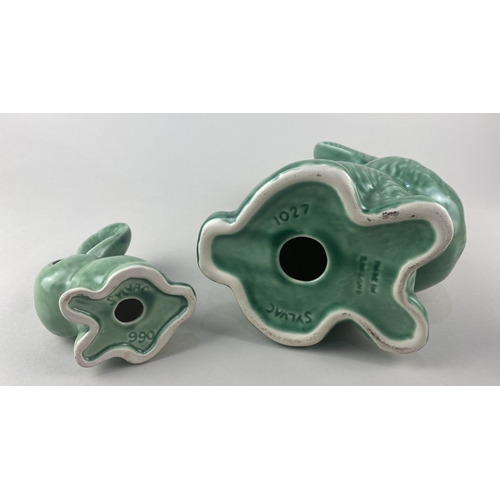 24 - Two post 1982 green glazed Sylvac models of bunnies comprising no 1027 23cm high, and no 990 12cm hi... 