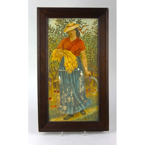 26 - An oak framed set of two wall tiles painted with a figure harvesting with a scythe frame has not bee... 