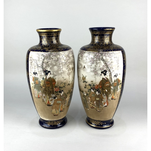 44 - A pair of Japanese satsuma ware baluster vases painted with panels of ladies and infants in a landsc... 