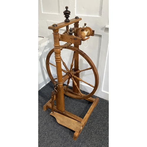 473 - A wooden spinning wheel crank action with foot pedal