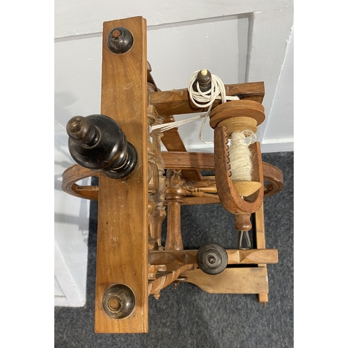 473 - A wooden spinning wheel crank action with foot pedal